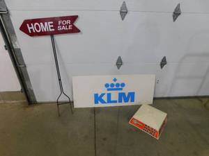 lot 3 image: (3) Signs - KLM Ticket Sign, Home for sale sign & Keys made here.