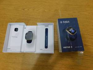 lot 33 image: Fitbit Versa 3 Smartwatch  MidnightSoft Gold
