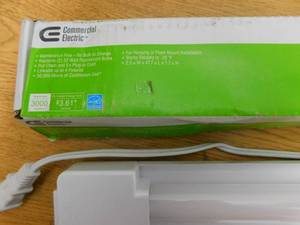 lot 38 image: (2) 4 ft. 88-Watt Equivalent Integrated LED Utility White Shop Light with Pull Chain, Bright White