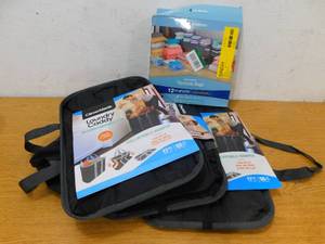 lot 58 image: Laundry Caddy  Hamper Bag & Vacuum bags