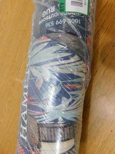 lot 72 image: New - Hampton Bay Blue Palm 5 ft. x 7 ft. IndoorOutdoor Area Rug