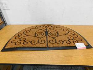 lot 81 image: TrafficMaster Half Medallion Natural 23.5 in. x 38.5 in. Coir and Rubber Door Mat
