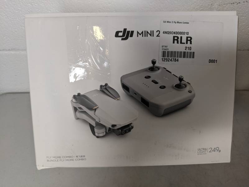 lot 69 image: DJI Mini 2 Fly More Combo Wi-Fi 4K Camera Drone Kit