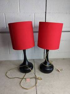 lot 19 image: Pair of Black Lamps with Red Shades