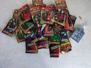 lot 43 image: Lot of (22) Ghoulish Glow Bracelets & Necklaces and a Tiny Headstone