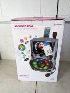 lot 11 image: Karaoke USA DVDCDGMP3G Karaoke System