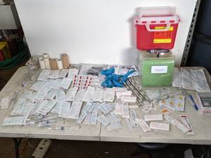lot 381 image: Large Lot of Medical Supplies IV Supplies, Sharps Container, Tape, Needles and Much More
