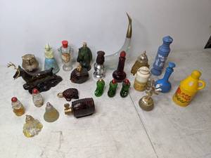 lot 390 image: Lot of (24) Avon Decanters & Bottles