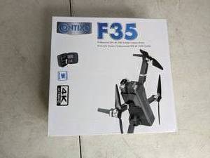 lot 129 image: Contixo F35 4K UHD Wi-Fi Camera Foldable GPS Quadcopter Drone