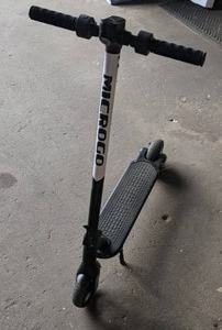 lot 438 image: GlareWheel ES-S8 Microgo Electric Scooter - Foldable & Lightweight, 12m