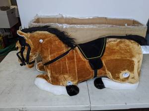 lot 466 image: Happy Trails Spring Horse Plush Ride-On Toy with Sounds