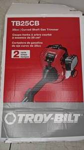 lot 594 image: Troy-Bilt 25cc 2-Cycle Curved-Shaft Gas Trimmer