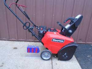 Snapper model 7522 electric start snow thrower. Looks lightly used. Tested & works. As shown.