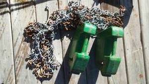 lot 12 image: John Deere Weights (2) and Tire Chains.
