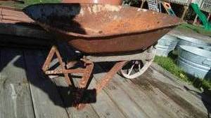 lot 16 image: Vintage Wheelbarrow with Replacement Handle.