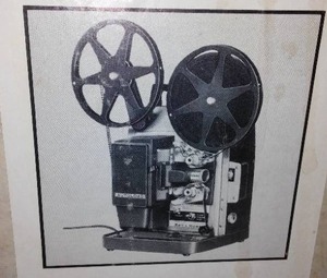 lot 29 image: Bell and Howell Super 8 Movie Projector.