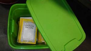 lot 34 image: National Geographics in Covered Tote.