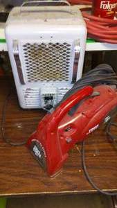 lot 39 image: Dirt Devil Hand Vacuum, Heater, Tote.