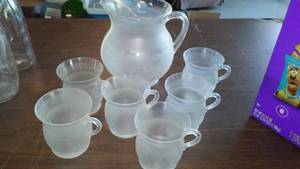 lot 139 image: Vintage Kool Aid Pitcher & Glass Set Plastic.