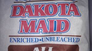 lot 147 image: 25 Lb. Dakota Maid Flour in Covered Tote.