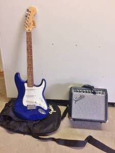 lot 66 image: WOW Fender Squier Strat Electric Guitar and Fender 15G Amp - Excellent Working Condition