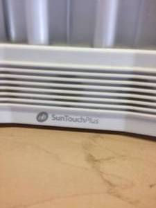 lot 69 image: NatureBright SunTouch Plus 4040 Bright Light Therapy