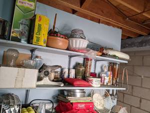 Three Shelves Full of Vintage Items Food Chopper, Baking Pans, Etc.&nbsp