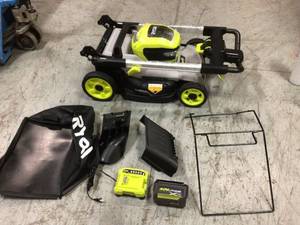 40V HP Brushless 21 in. Battery Walk Behind Push Lawn Mower with 7.5 Ah Battery and Rapid Charger by RYOBI Customer Returns See Pictures