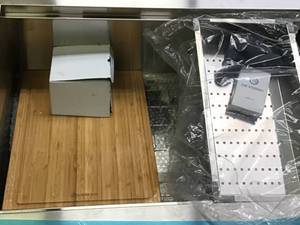 lot 17 image: Glacier Bay All-in-One Apron-Front Farmhouse Stainless Steel 30 in. Single Bowl Workstation Sink with Accessory Kit &nbspCustomer Returns See Pictures 
