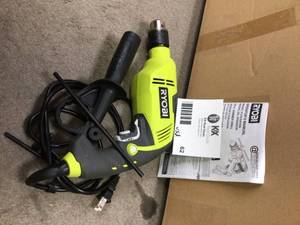lot 62 image: RYOBI 6.2 Amp Corded 58 in. Variable Speed Hammer Drill  USED &nbspCustomer Returns See Pictures 