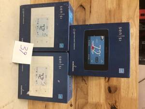 Assorted Sensi Touch smart thermostat (blackwhite ) Customer Returns See Pictures