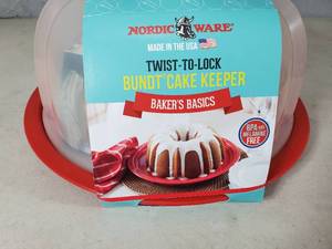 lot 18 image: New Nordic Ware Bundt Cake Pan and Cake Keeper