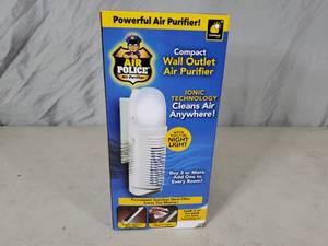 lot 63 image: New Air Police Wall Outlet Air Purifier with Nightlight