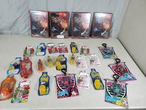 lot 176 image: 4 New Dvds, Lip Balms, and More