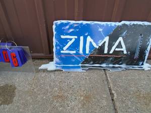 Zima tin sign. Is missing thermometer. 31 x 14. As shown.