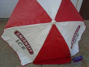 Smirnoff ice vinyl patio umbrella. No extension pole. As shown.