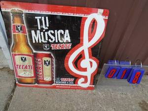 Used Tecate tu musica tin. 20 x 20. As shown.