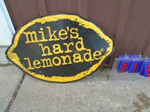 Used Mikes hard lemonade. Smoke stained. 28 x 19. As shown.