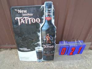 NOS Captain Morgan tatoo rum tin. 13 x 19. As shown.