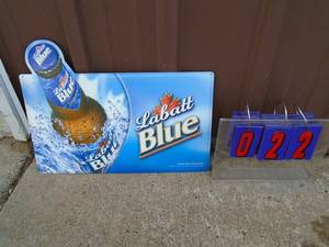 NOS Labatt blue tin. 20 x 15. As shown.