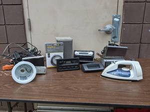 lot 22 image: Car Radio And More Bundle-Clarion dx375mp radio Sony Radio  Laptop Cable Lock Panasonic Steam Iron Lighting Fixture