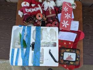 lot 40 image: Christmas Decor Bundle- Ribbon, Light-up Trees, Plush Characters And More