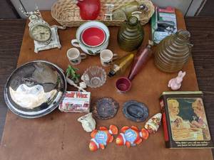 lot 45 image: Collectible Decor Bundle- Antiques, Glass Oil lamps, Candles, Vintage Clock, Copper Ashtrays, Silver-Plated  Covered Platte And More