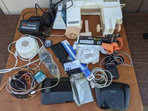 lot 73 image: The Best Electrical Bundle Ever-Turbo Spa, Modems, Steam Iron, Kool Mate ACDC Convertor, And More