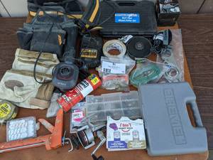 lot 75 image: The Best Tool Bundle Ever0 Dremel, Pittsburg Bolt Type Wheel Puller Set, Dewalt Battery Charger, Tool Belts And More