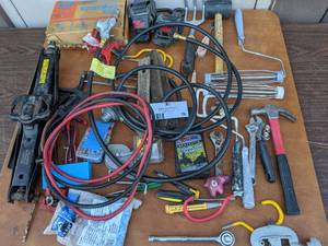 lot 76 image: Tool Bundle-Adjustable Wrenches  Cables  Paint Rollers  Soldering Gun  Rod Savers  Jack  And More