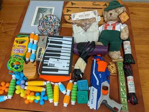 lot 28 image: Toys, Plush, and More Bundle-Elite Nerf-Style Gun, Swiss Bear, Markers, Toy Keyboard, Decorative Sled, Toy Blocks, And More