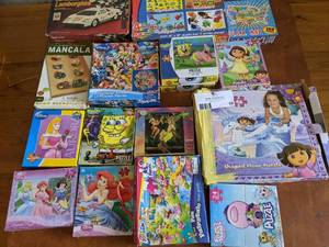 lot 33 image: Childrens Books and Car Bundle-Puzzles, R.C. Lamborghini Model Car, Mancala Game, And More