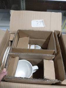 lot 39 image: ELMA WHITE LACE 16 PIECE STONEWARE DINERWARE SET
