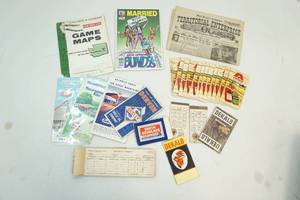 Magazine, notepads and road maps